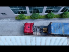 Logistique en action: chargement de pièces de camions destinées à l'exportation britannique